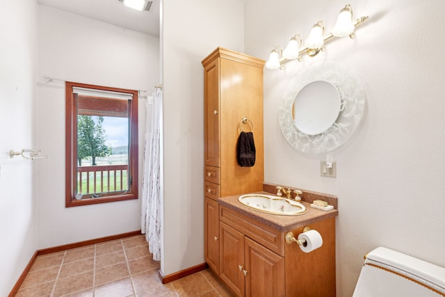 2549 Horseshoe Hills Trl, Seeley Lake, MT 59868 - full bath with vanity and tile patterned floors