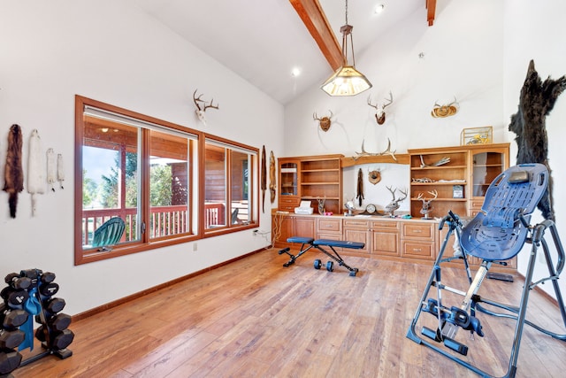 2549 Horseshoe Hills Trl, Seeley Lake, MT 59868 - office area featuring high vaulted ceiling, light wood finished floors, and beamed ceiling