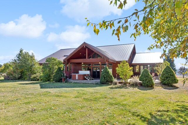 2549 Horseshoe Hills Trl, Seeley Lake, MT 59868 - rear view of property with a yard and a metal roof