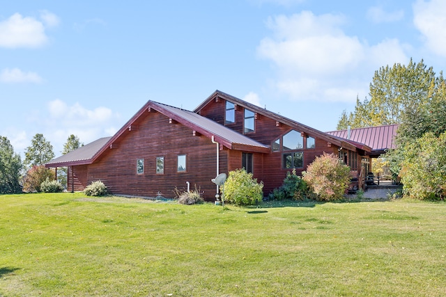 2549 Horseshoe Hills Trl, Seeley Lake, MT 59868 - view of home's exterior featuring a yard and a metal roof