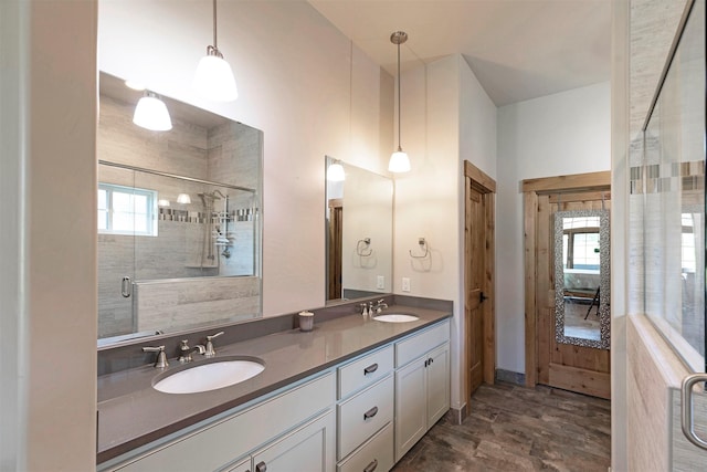 780 Anglers Bend Way, Missoula, MT 59802 - bathroom featuring double vanity, a shower stall, a wealth of natural light, and a sink