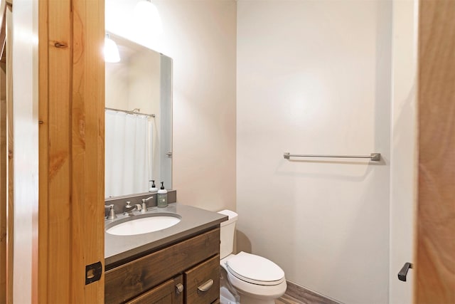 780 Anglers Bend Way, Missoula, MT 59802 - bathroom with vanity, a shower with shower curtain, and toilet