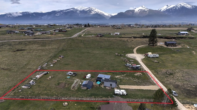 bird's eye view featuring a rural view and a mountain view