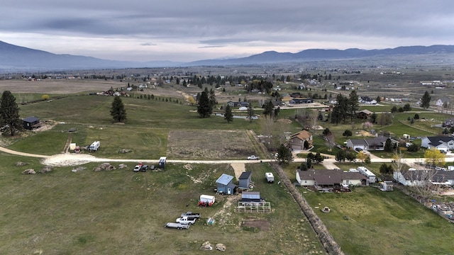 aerial view with a mountain view and a rural view