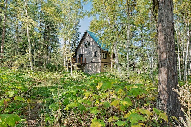 675 Beaver Lake Rd, Whitefish, MT 59937 - view of side of property featuring a deck