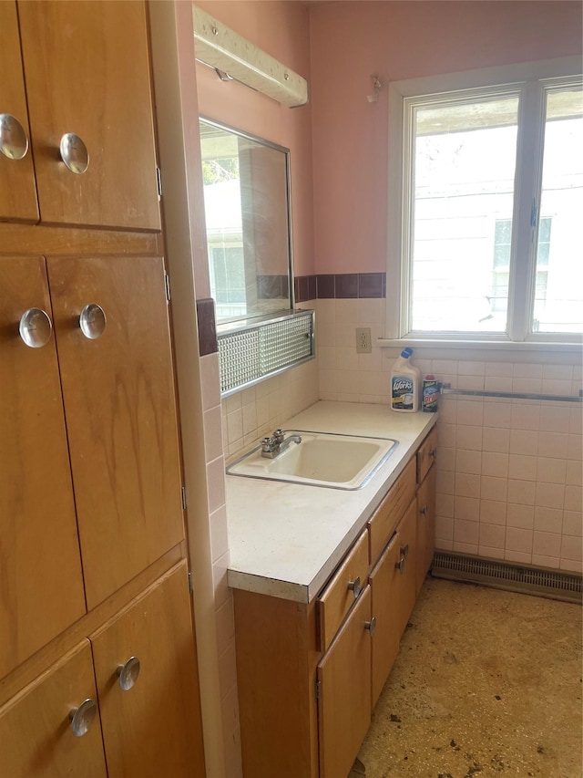 800 16th St S, Great Falls, MT 59405 - bathroom with tile walls, vanity, and wainscoting