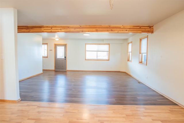 2226 Burlington Ave Unit A, Missoula, MT 59801 - interior space featuring baseboards, beam ceiling, and wood finished floors