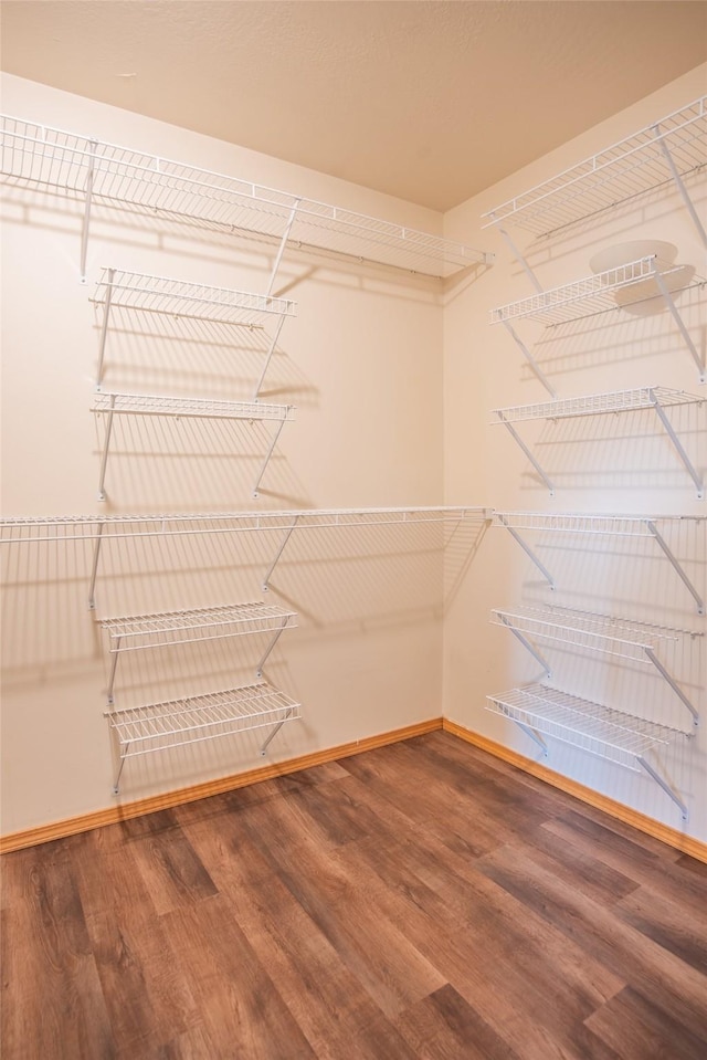 2226 Burlington Ave Unit A, Missoula, MT 59801 - walk in closet featuring wood finished floors
