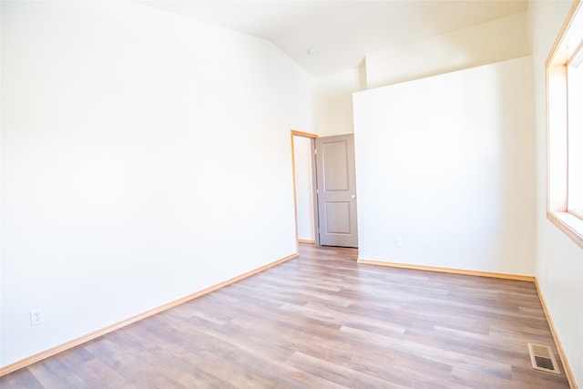 2226 Burlington Ave Unit A, Missoula, MT 59801 - spare room featuring visible vents, baseboards, and wood finished floors