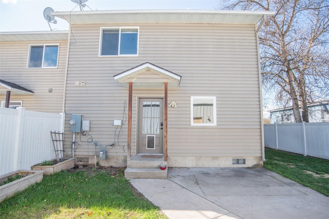 2226 Burlington Ave Unit A, Missoula, MT 59801 - view of front of home with fence and a patio