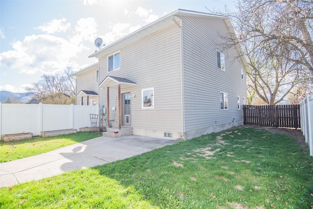 2226 Burlington Ave Unit A, Missoula, MT 59801 - view of front of property with a fenced backyard and a front lawn
