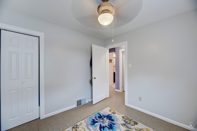 730 N Montana Ave, Helena, MT 59601 - unfurnished bedroom featuring visible vents, a ceiling fan, light carpet, a closet, and baseboards