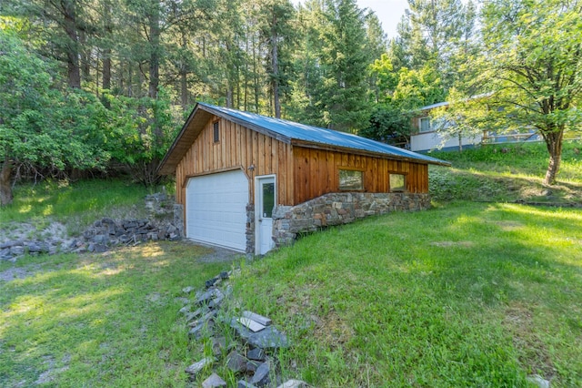 garage with a wooded view