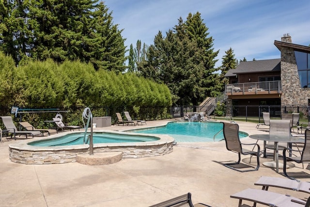 105 Oliver Ln Unit 7, Bigfork, MT 59911 - community pool featuring a patio and stairway