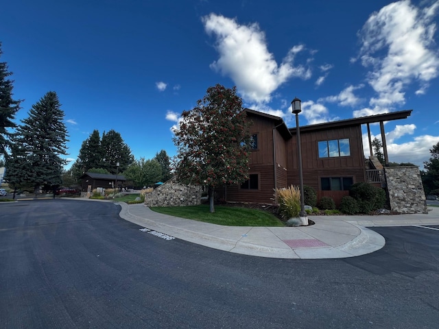 105 Oliver Ln Unit 7, Bigfork, MT 59911 - view of front of property with board and batten siding