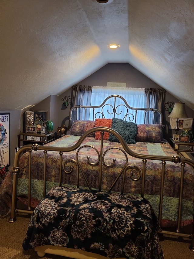 living room featuring lofted ceiling, carpet, and a textured ceiling
