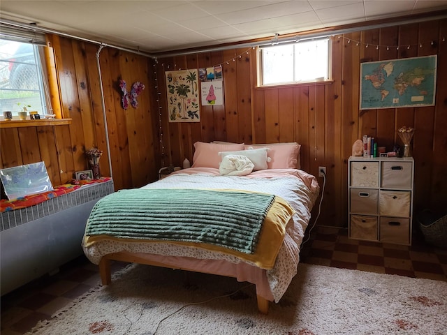 living area with tile patterned floors