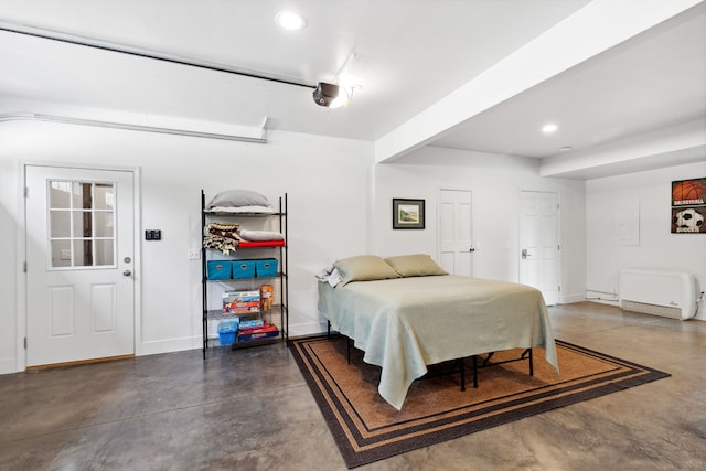 5608 Trinity Way, Florence, MT 59833 - bedroom featuring baseboards, finished concrete floors, and recessed lighting