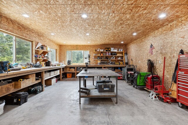 5608 Trinity Way, Florence, MT 59833 - miscellaneous room featuring concrete floors, a workshop area, and recessed lighting