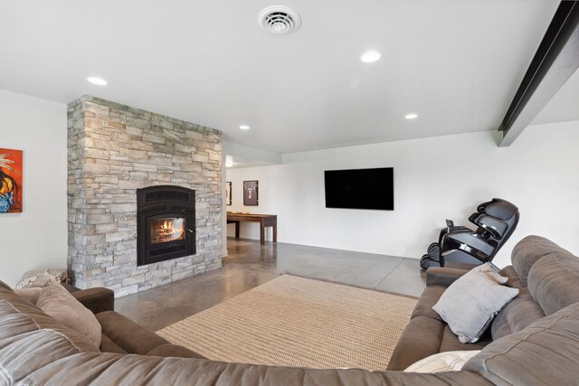 5608 Trinity Way, Florence, MT 59833 - living area featuring a fireplace, visible vents, finished concrete floors, and recessed lighting