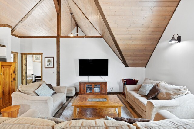 5608 Trinity Way, Florence, MT 59833 - living room featuring wooden ceiling, baseboards, wood finished floors, and vaulted ceiling with beams