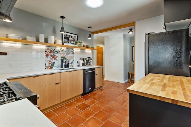 4210 Lincoln Rd, Missoula, MT 59802 - kitchen featuring freestanding refrigerator, a sink, dishwashing machine, open shelves, and decorative backsplash