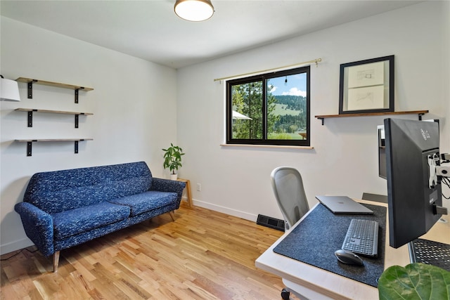4210 Lincoln Rd, Missoula, MT 59802 - office area featuring light wood-type flooring and baseboards