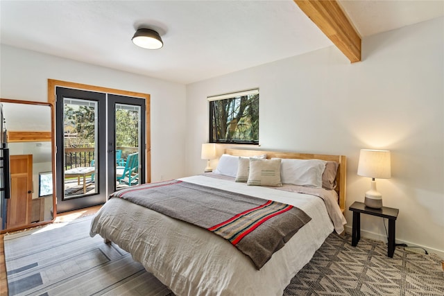 4210 Lincoln Rd, Missoula, MT 59802 - bedroom featuring baseboards, beamed ceiling, and access to outside