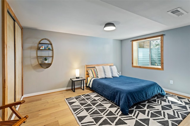 4210 Lincoln Rd, Missoula, MT 59802 - bedroom with baseboards, light wood-style flooring, and visible vents