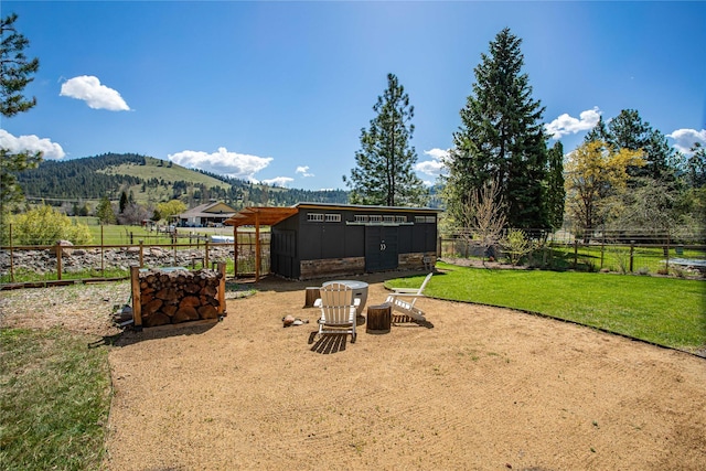 4210 Lincoln Rd, Missoula, MT 59802 - view of yard with a mountain view and fence