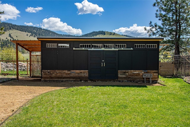 4210 Lincoln Rd, Missoula, MT 59802 - view of shed with a mountain view and fence
