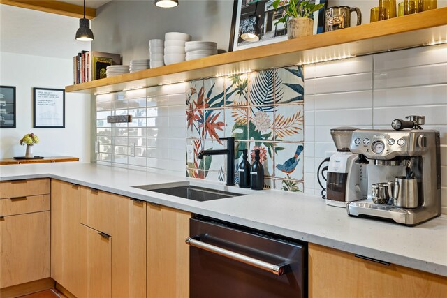 4210 Lincoln Rd, Missoula, MT 59802 - kitchen with light brown cabinets, stainless steel dishwasher, light stone counters, a sink, and open shelves
