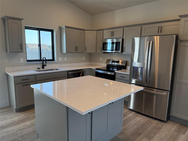 3431 Goldenrod Ln, Kalispell, MT 59901 - kitchen featuring a sink, appliances with stainless steel finishes, gray cabinets, and light wood-type flooring