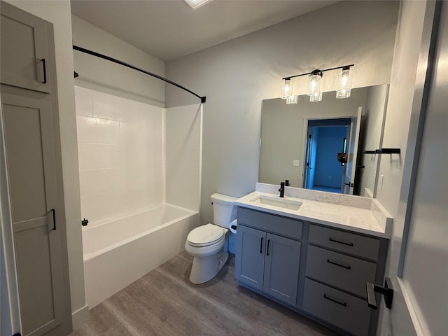 3431 Goldenrod Ln, Kalispell, MT 59901 - bathroom featuring vanity, shower / bathtub combination, toilet, and wood finished floors