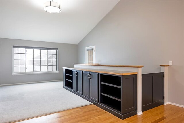 4891 Christian Dr, Missoula, MT 59803 - unfurnished office featuring wood ceiling, built in study area, and light wood-style flooring