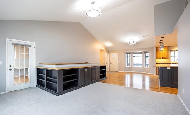 4891 Christian Dr, Missoula, MT 59803 - unfurnished bedroom featuring a spacious closet, light carpet, crown molding, and baseboards