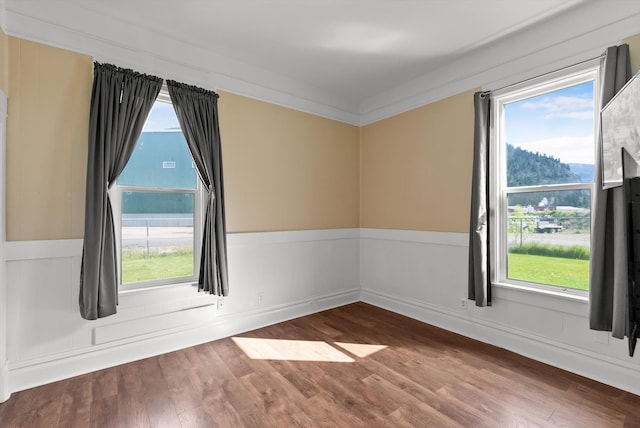 360 White House Ln, Bonner, MT 59823 - empty room with dark wood-style floors and healthy amount of natural light