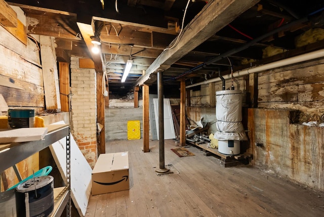360 White House Ln, Bonner, MT 59823 - unfinished below grade area with water heater and wood-type flooring