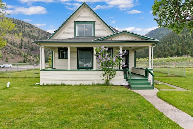 360 White House Ln, Bonner, MT 59823 - view of front of house featuring covered porch and a mountain view