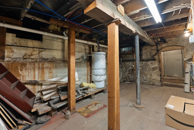 360 White House Ln, Bonner, MT 59823 - unfinished basement featuring strapped water heater