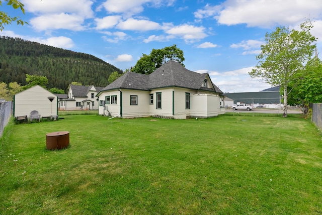 360 White House Ln, Bonner, MT 59823 - back of property with roof with shingles