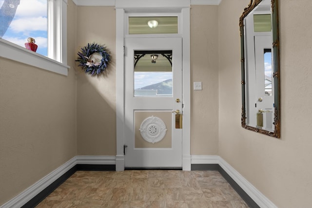 360 White House Ln, Bonner, MT 59823 - doorway featuring baseboards
