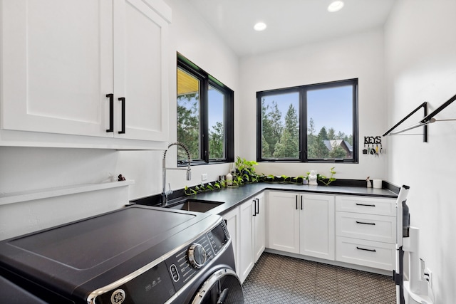 washroom with cabinet space, carpet floors, recessed lighting, and a sink