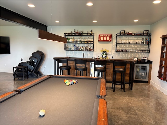 rec room with baseboards, recessed lighting, finished concrete flooring, billiards, and indoor wet bar