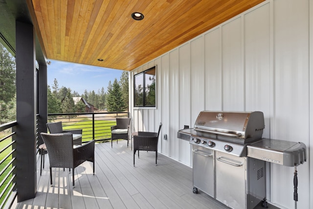 deck featuring a grill