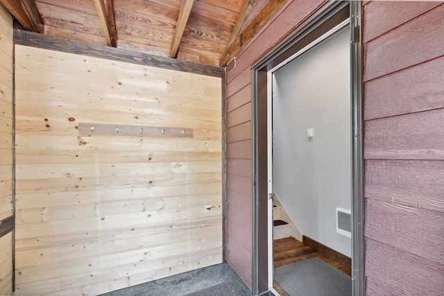 view of exterior entry with visible vents