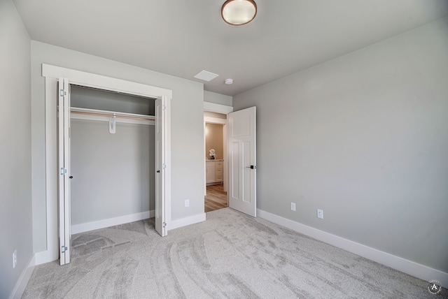 215 Meadow View Loop, East Helena, MT 59635 - unfurnished bedroom with carpet, a closet, and baseboards