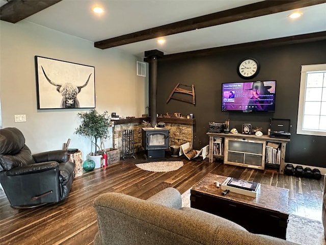 11 High Country Ct, Plains, MT 59859 - living area with recessed lighting, wood finished floors, beam ceiling, visible vents, and a wood stove