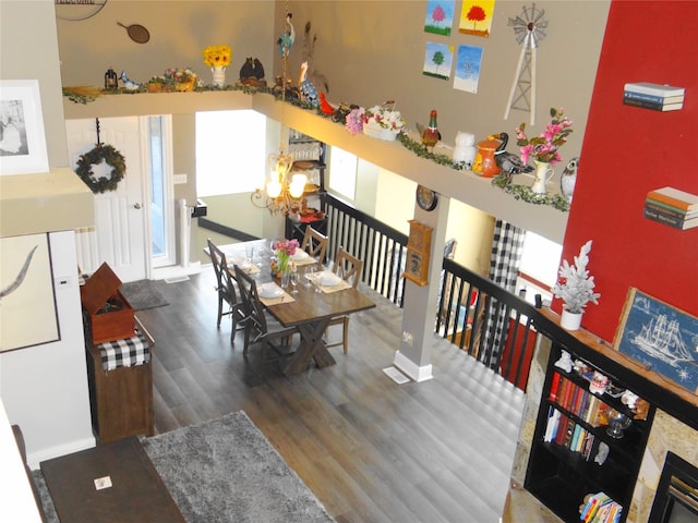 652 Simms Ashuelot Rd, Fort Shaw, MT 59443 - dining room featuring an inviting chandelier, baseboards, and wood finished floors