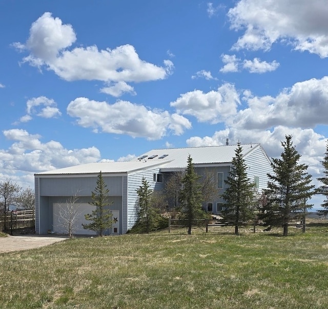 652 Simms Ashuelot Rd, Fort Shaw, MT 59443 - exterior space featuring an attached garage and driveway